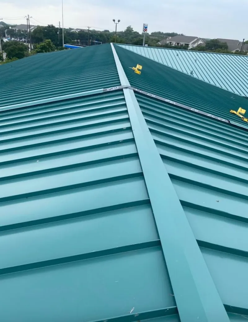 Green commercial metal roof ridge and valley for Metal Roof Repair in Maumee
