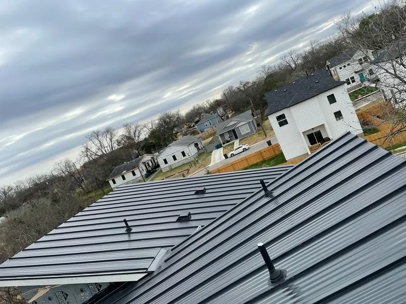 Standing seam metal roof panels with vents for Skylight Repair in Maumee